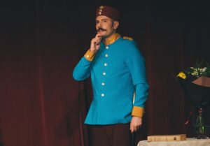Santiago Arca Henon performing as "The Count", in the scene "The Actress and the Count", from La Ronde, an avant-garde play published in 1900 by Austrian playwright Arthur Schnitzler. The Count is a Captain of Dragoons of the Austro-Hungarian empire (KuK Dragoner). Warsaw, June 2024. As part of the Weekend Acting School for Adults, of the Akademia Sztuki i Kultury.