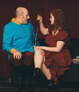 Santiago Arca Henon performing as "The Count", in the scene "The Actress and the Count", from La Ronde, an avant-garde play published in 1900 by Austrian playwright Arthur Schnitzler. The Count is a Captain of Dragoons of the Austro-Hungarian empire (KuK Dragoner). Warsaw, June 2024. As part of the Weekend Acting School for Adults, of the Akademia Sztuki i Kultury.