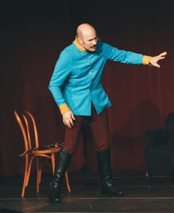 Santiago Arca Henon performing as "The Count", in the scene "The Actress and the Count", from La Ronde, an avant-garde play published in 1900 by Austrian playwright Arthur Schnitzler. The Count is a Captain of Dragoons of the Austro-Hungarian empire (KuK Dragoner). Warsaw, June 2024. As part of the Weekend Acting School for Adults, of the Akademia Sztuki i Kultury.