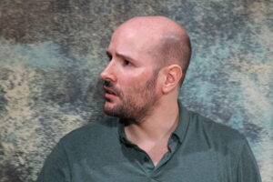 Santiago Arca Henon performing improvisation in English with Jest Set, an improv group, at bar Południk Zero, in Warsaw.