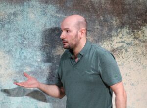 Santiago Arca Henon performing improvisation in English with Jest Set, an improv group, at bar Południk Zero, in Warsaw.