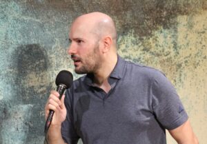 Santiago Arca Henon performing improvisation in English with Jest Set, an improv group, at bar Południk Zero, in Warsaw.