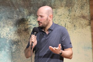 Santiago Arca Henon performing improvisation in English with Jest Set, an improv group, at bar Południk Zero, in Warsaw.